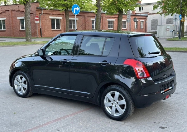 Suzuki Swift cena 16900 przebieg: 121000, rok produkcji 2009 z Gniezno małe 497
